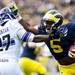 Michigan running back Justice Hayes runs the ball during the first half of the game against Northwestern on Saturday. The game is tied 14-14. Daniel Brenner I AnnArbor.com